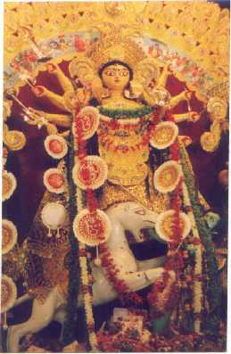 Stylized clay and shola image of Durga. Bengal, India.