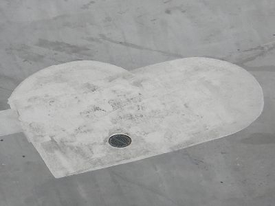 Heart painted in parking space.
