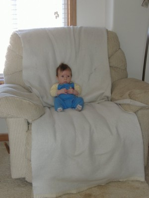 Small boy in big chair - age 3 months