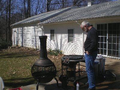 David preparing the grill