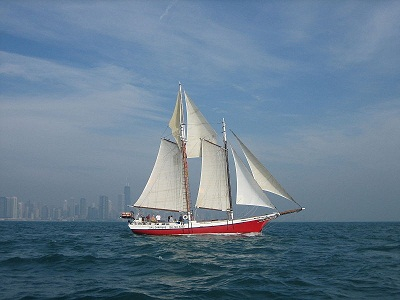 A picture of a red schooner