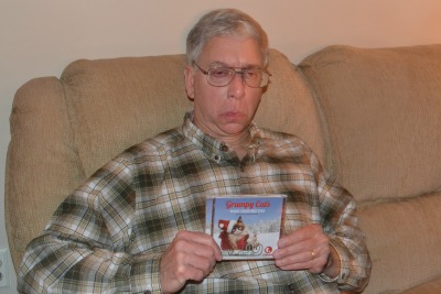 Dad loving his Grumpy Cat CD.