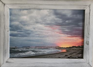 A pier on Cape Hatteras after the ravages of story and time.