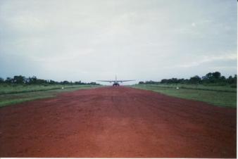 Touchdown ~   The French army cargo plane touched down just after dawn and headed down the air strip directly toward us, where we waited in formation at the end. 