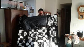 King Size Raiders Quilt for Alex ~  The quilt that started it all. He wanted a Raider's quilt and he is tall. The quilt kept growing. It is folded over in the picture.  