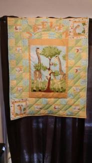 Jaelyn's baby Quilt ~ Made from Suzy Bee Zoey the giraffe fabric line.