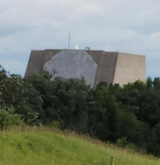 Parc Building Calalier SFS ~ This building is designed to withstand a direct hit.  The walls are cement.  Solid Cement.  No RF Signal/WiFi, whatever, can get in or out.  I apologize for the poor quality of the photo, I was at least a mile away when I took the photo, I was not allowed to take one any closer.