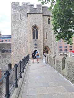 Salt Tower ~ The upper storeys of this 1230 tower were built as luxurious accommodation, with a large fireplace and a decorative window. Used as a prison for centuries, the first floor has many fine examples of prisoners' graffiti